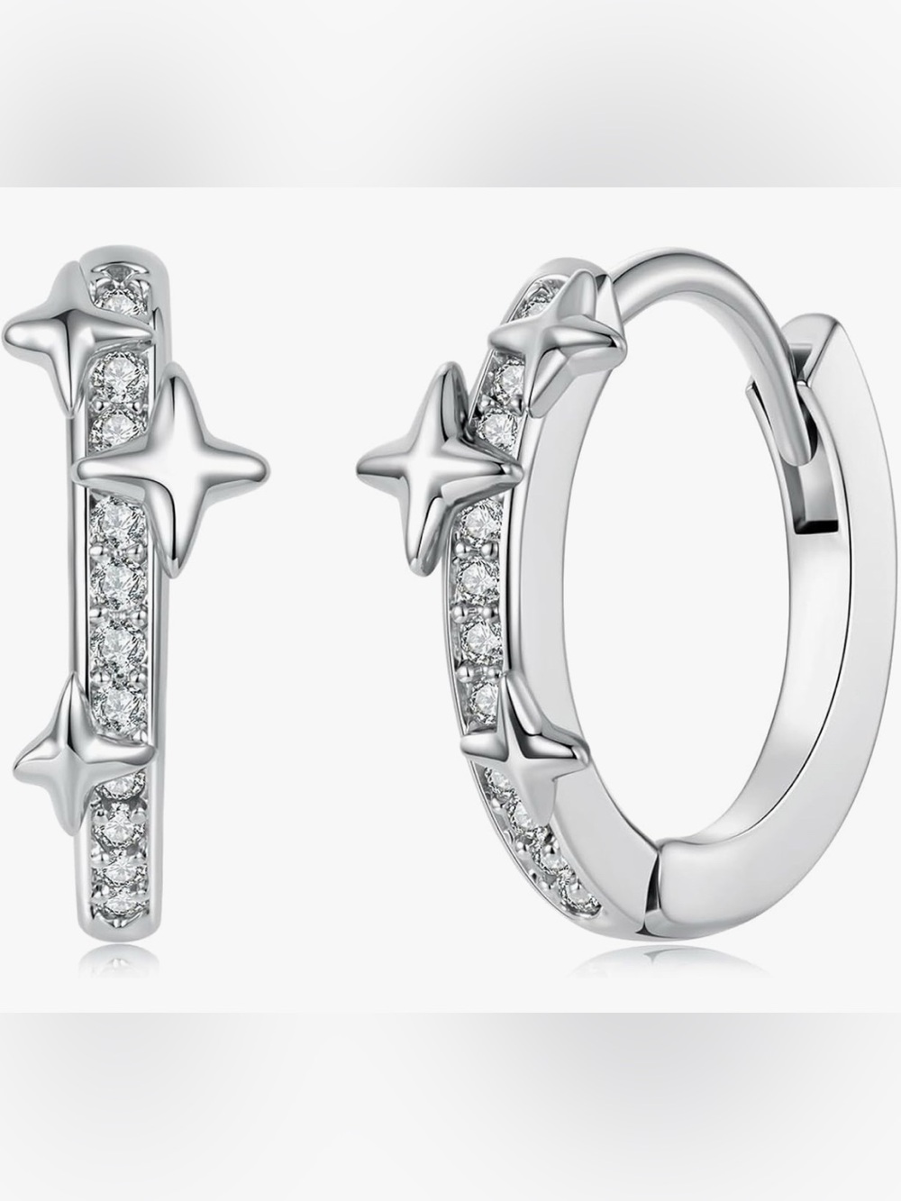 Cute Neiman Marcus 18KT white gold over Silver set white topaz space star Huggie